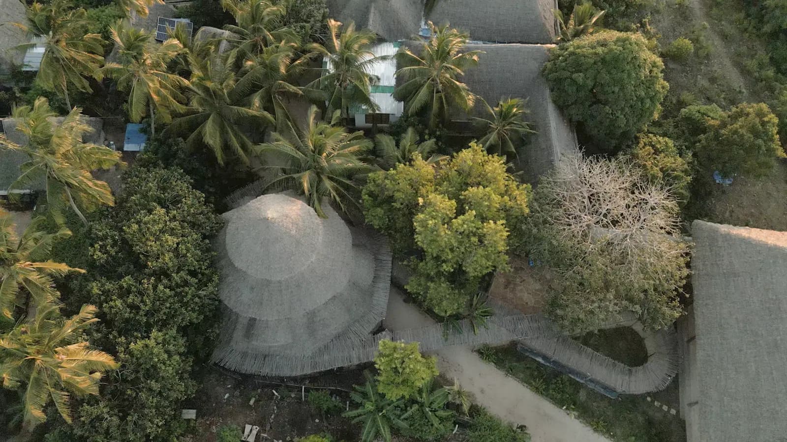 Aerial view of Assalam's circular Makuti-roofed Amphitheatre
